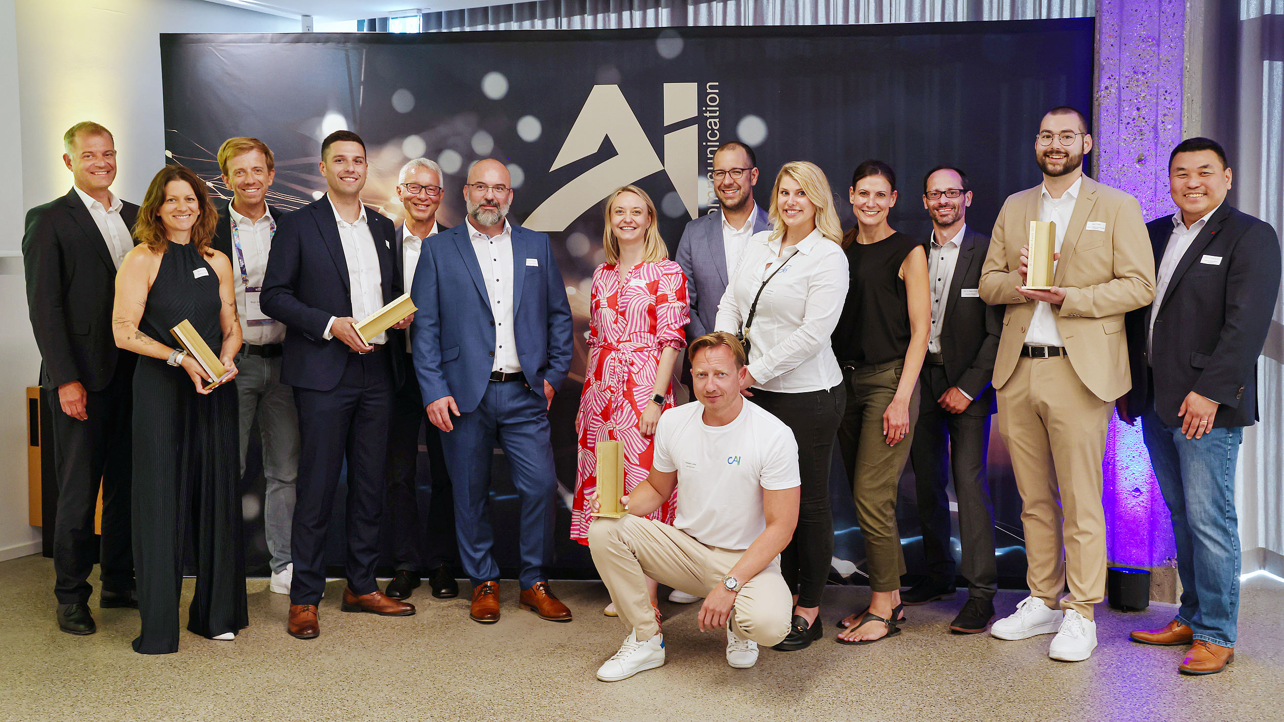 Gewinner 2025 mit Jury-Mitgliedern Gewinner AI Communication Award 2025 mit einigen Jury-Mitgliedern